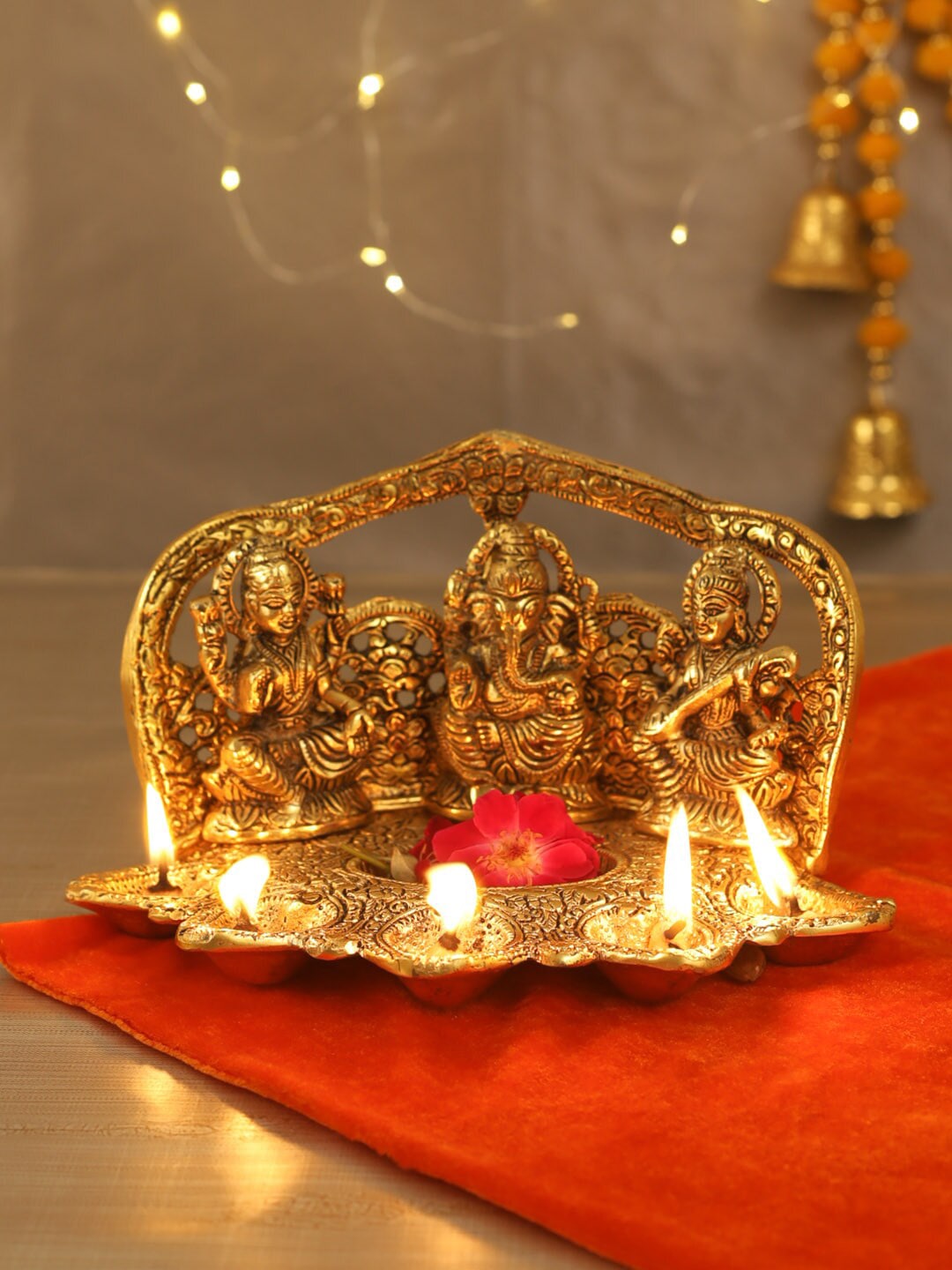 TIED RIBBONS Gold-Toned Textured Metal Handcrafted Laxmi Ganesh Saraswati Idol Showpiece Price in India