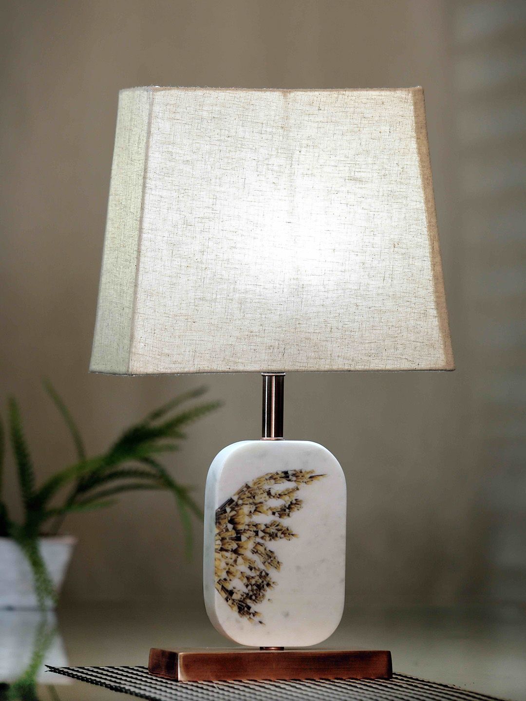 POSH-N-PLUSH Beige Solid Winged Marble Table Lamp Price in India