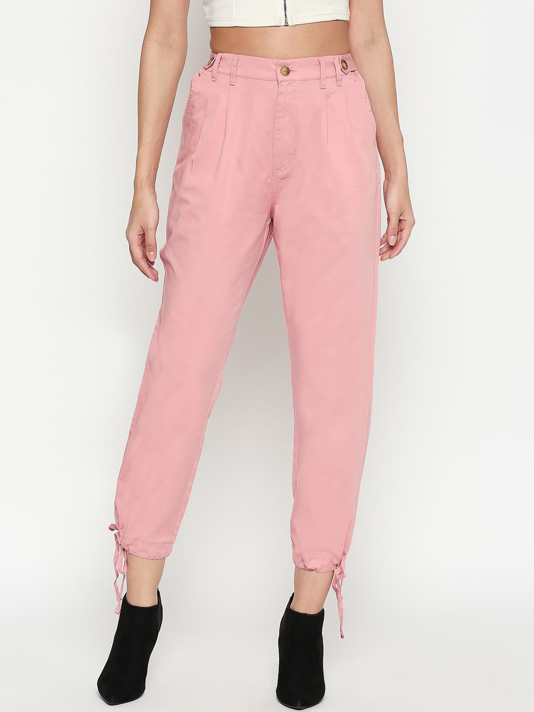 People Women Pink Slim Fit Solid Joggers Price in India