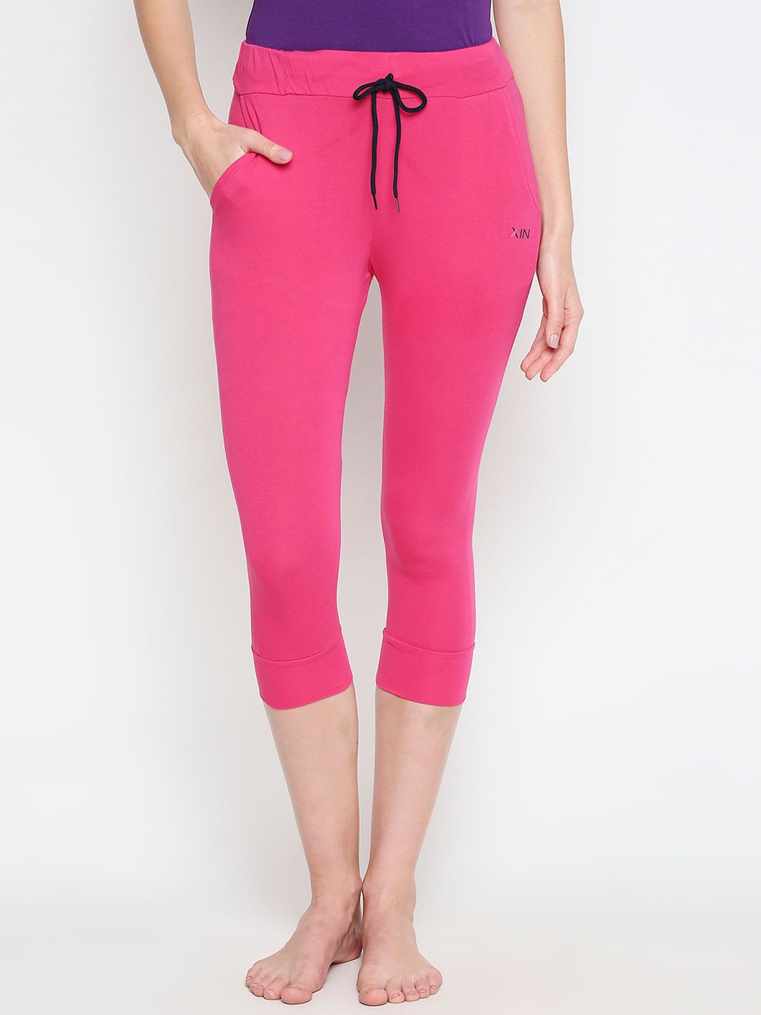 XIN Women Pink Solid Lounge Pants Price in India