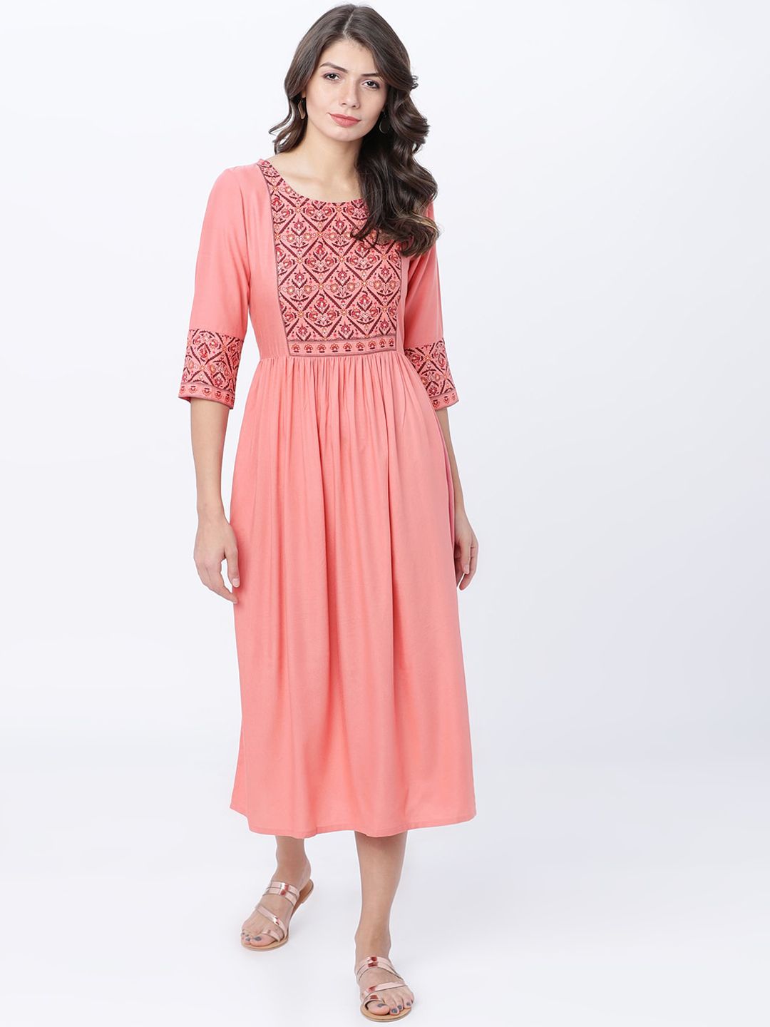 Vishudh Women Coral Peach Solid Fit & Flare Dress Price in India