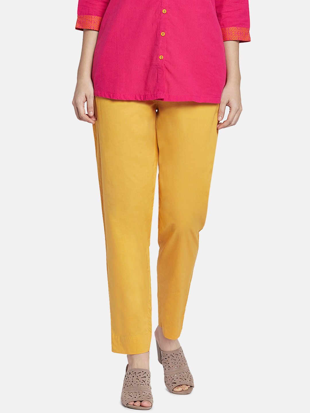 Go Colors Women Yellow Tapered Fit Solid Cigarette Trousers Price in India