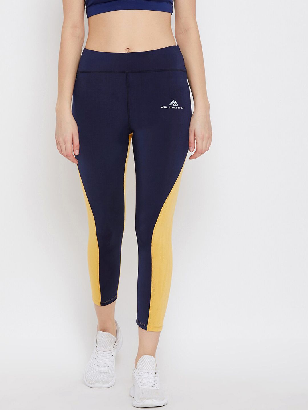 AGIL ATHLETICA Women Blue & Yellow Colourblocked Rapid-Dry Tights Price in India