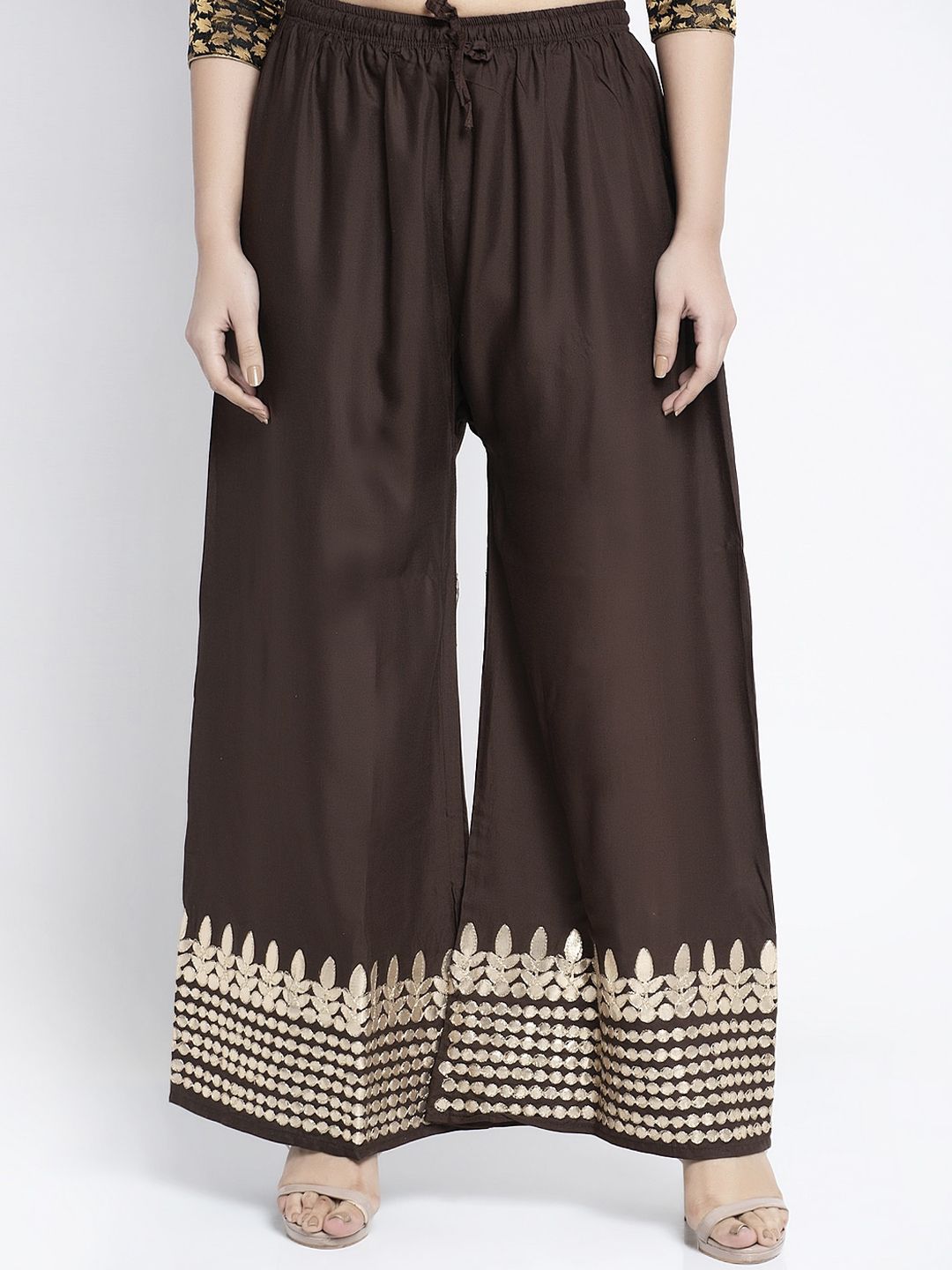 GRACIT Women Brown & Gold-Toned Hem Design Flared Palazzos Price in India