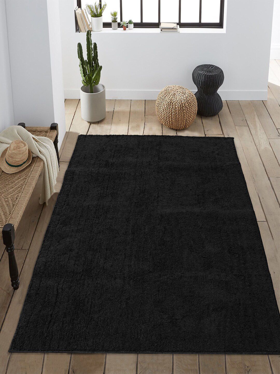 Saral Home Black Solid Anti-Skid Carpet Price in India