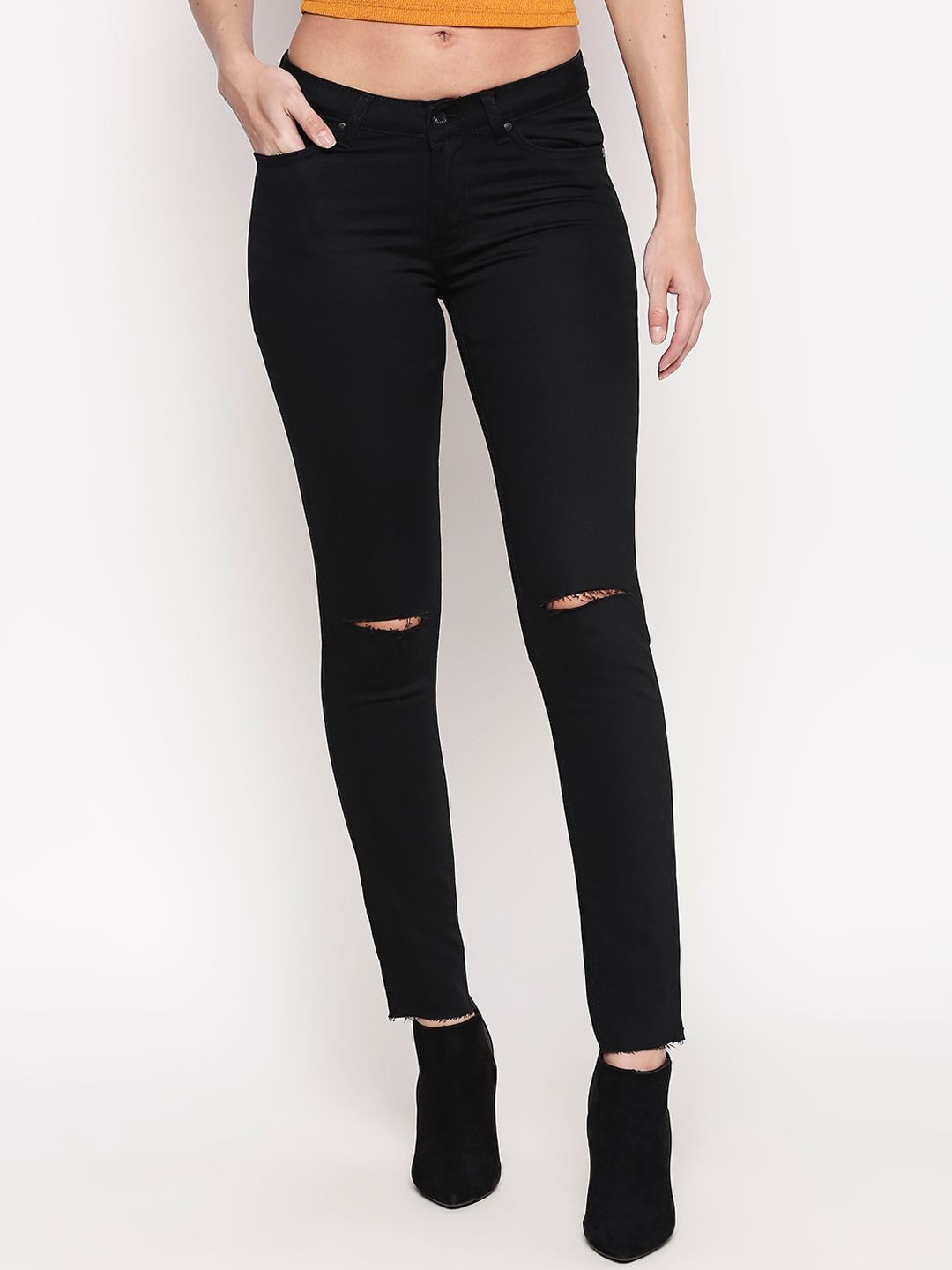 People Women Black Tapered Fit Mid-Rise Slash Knee Cotton Jeans Price in India