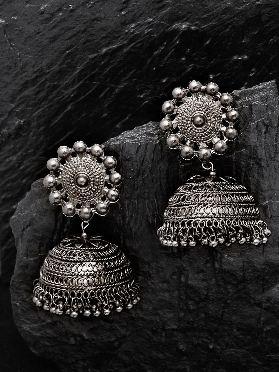 PANASH Silver-Toned Dome Shaped Jhumkas Price in India