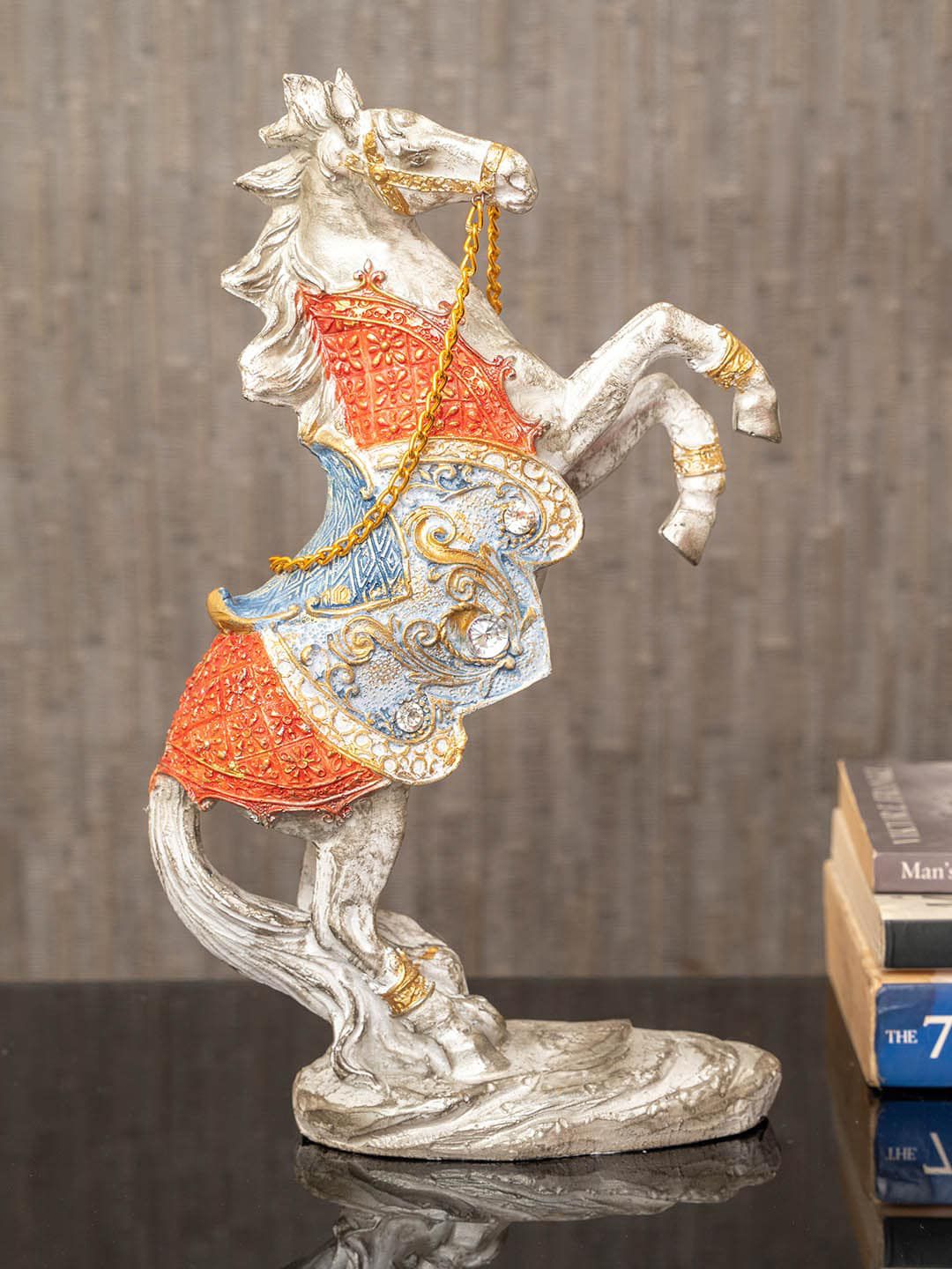 TIED RIBBONS Silver-Toned & Red Roaring Horse Statue Showpiece Price in India