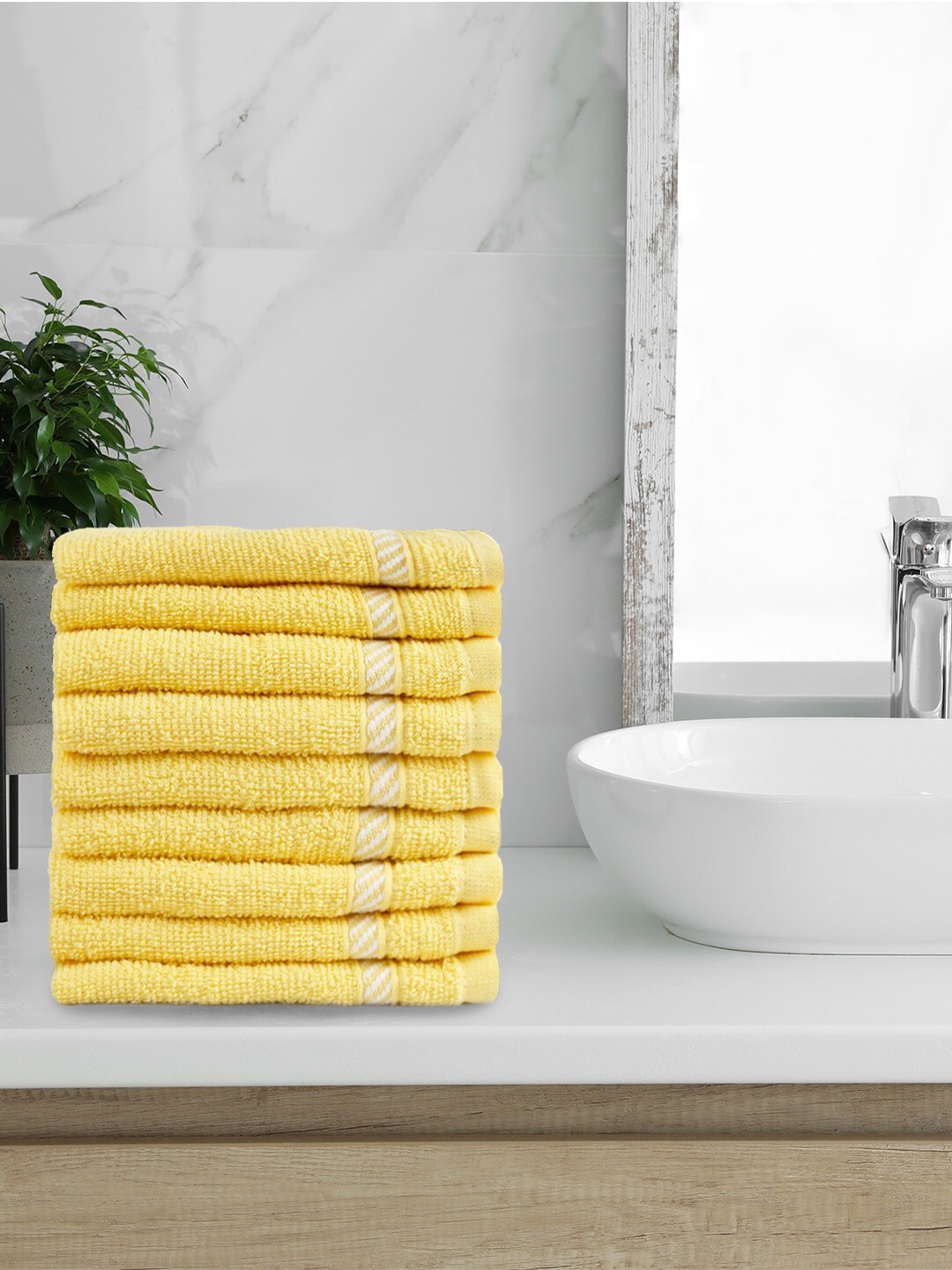 Trident Set of 9 Yellow & White Solid 380 GSM Face Towels Price in India