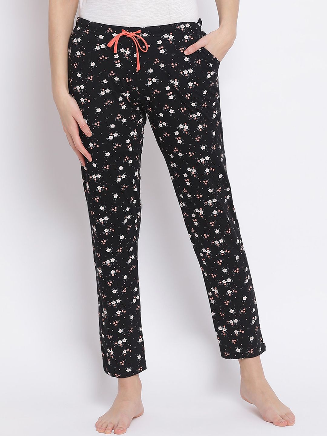 Kanvin Women Black & White Printed Lounge Pants Price in India