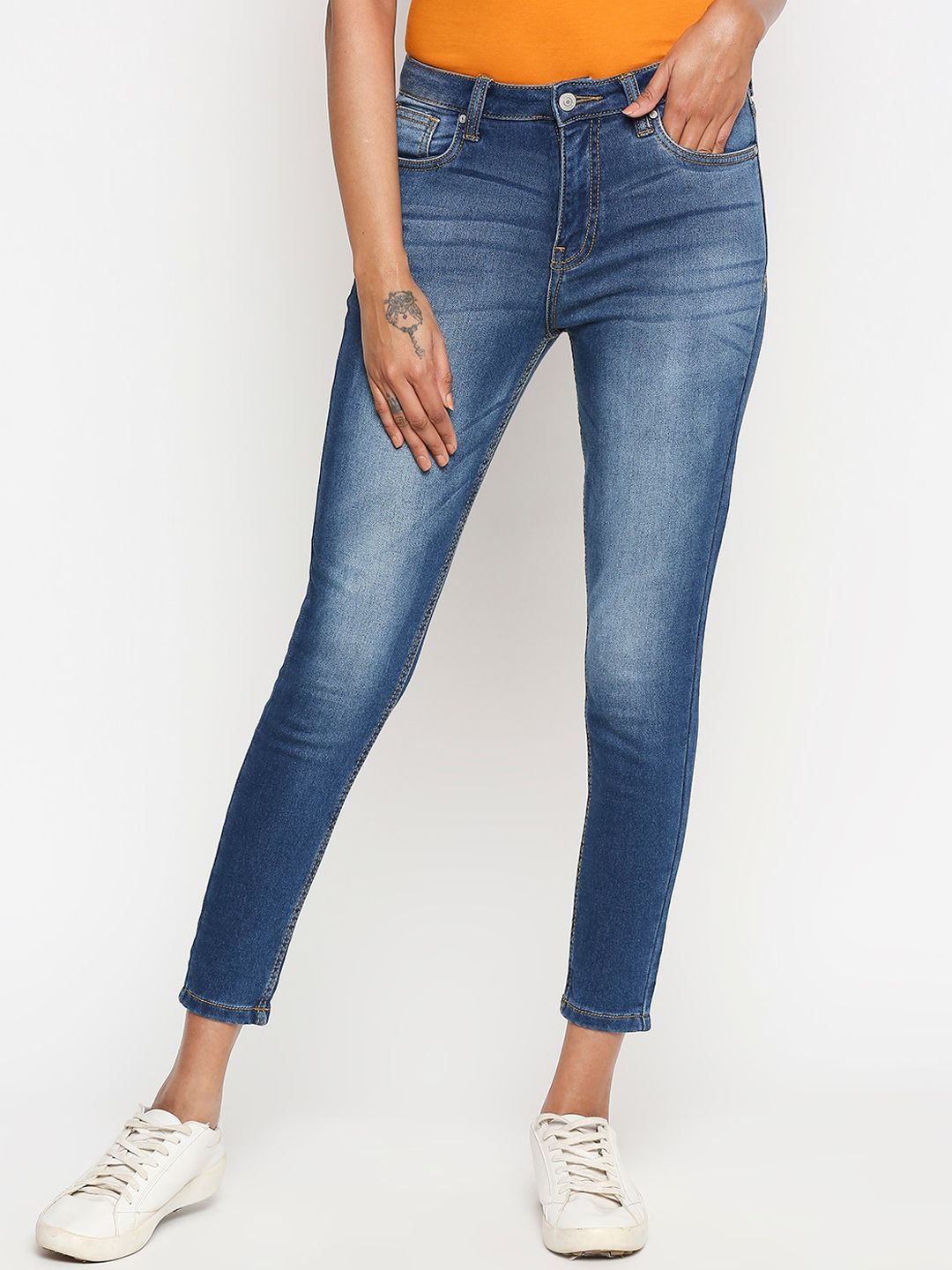 People Women Blue Skinny Fit Mid-Rise Clean Look Stretchable Cropped Jeans Price in India
