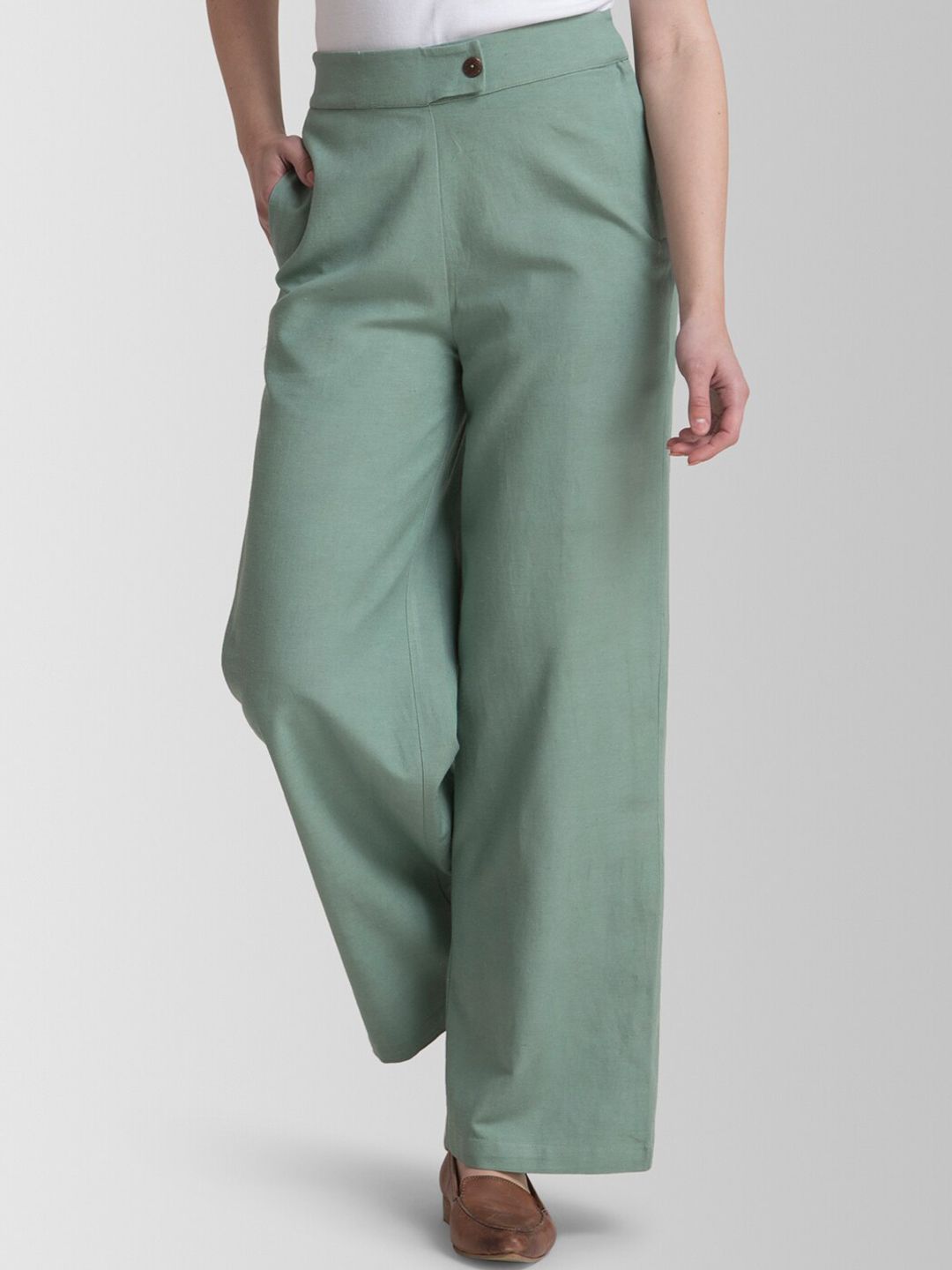 FableStreet Women Green Flared Solid Parallel Trousers Price in India