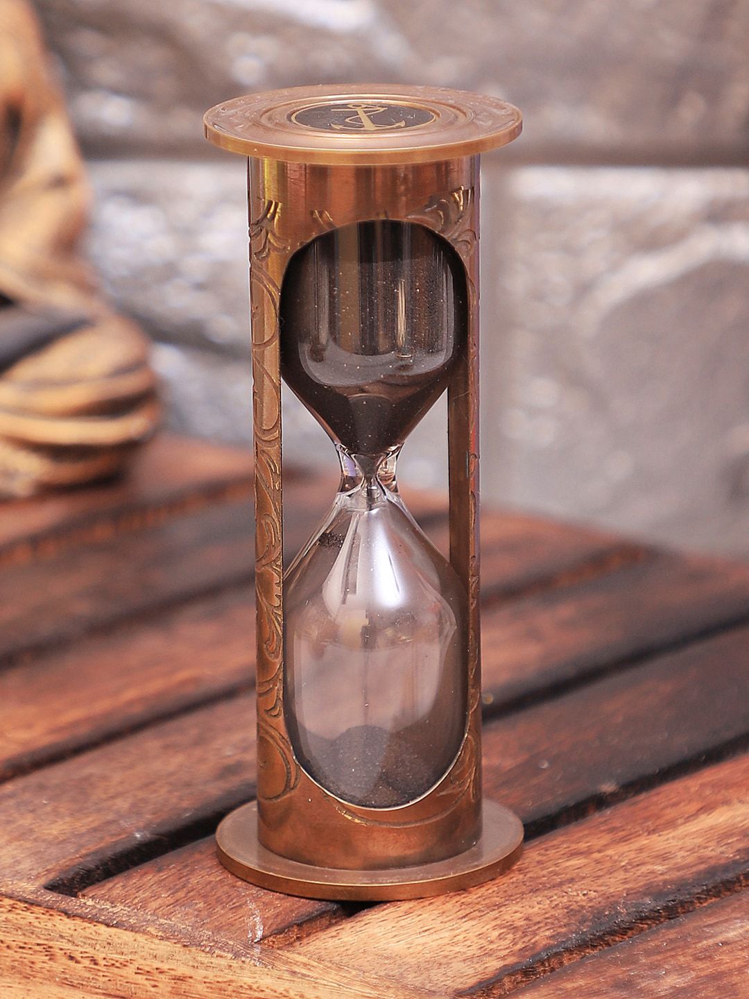 EXIM DECOR Gold-Toned & Black Tube Type Sand Timer Showpiece Price in India