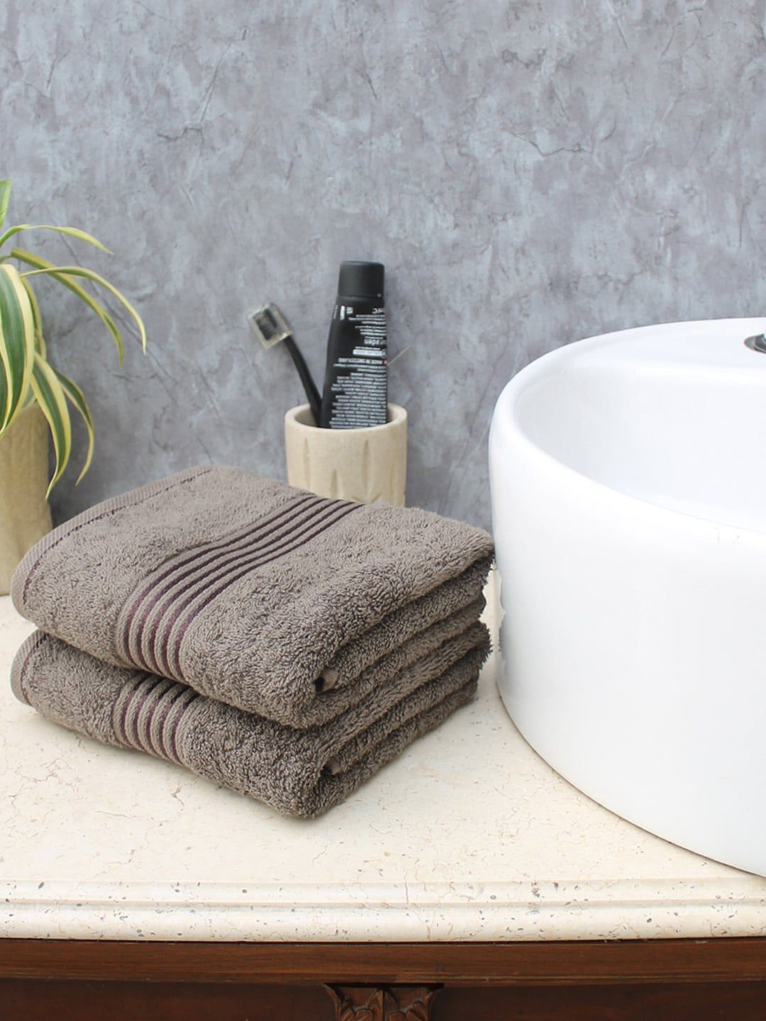 AVI Living Set Of 2 Brown Solid 550 GSM Hand Towels Price in India