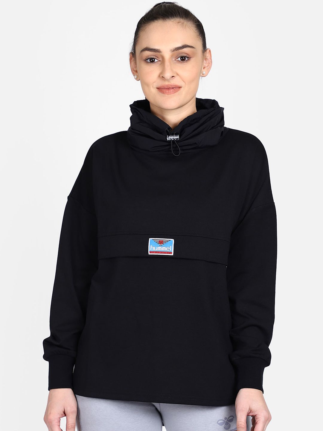 hummel Women Black Solid Hooded Sweatshirt Price in India