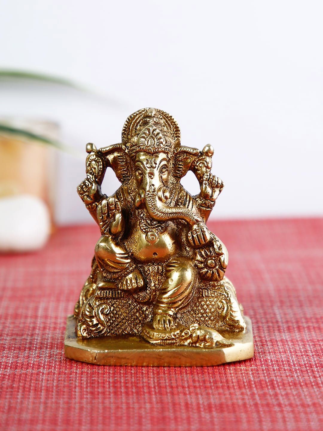 CraftVatika Gold-Toned Lord Ganesh Idol Showpiece Price in India