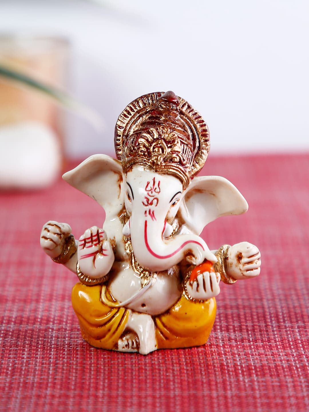 CraftVatika Yellow & Beige Ganesha Idol Showpiece Price in India