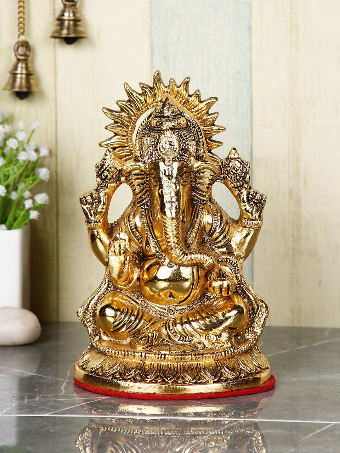 CraftVatika Gold-Toned Lord Ganesha Idol Murti Showpiece Price in India