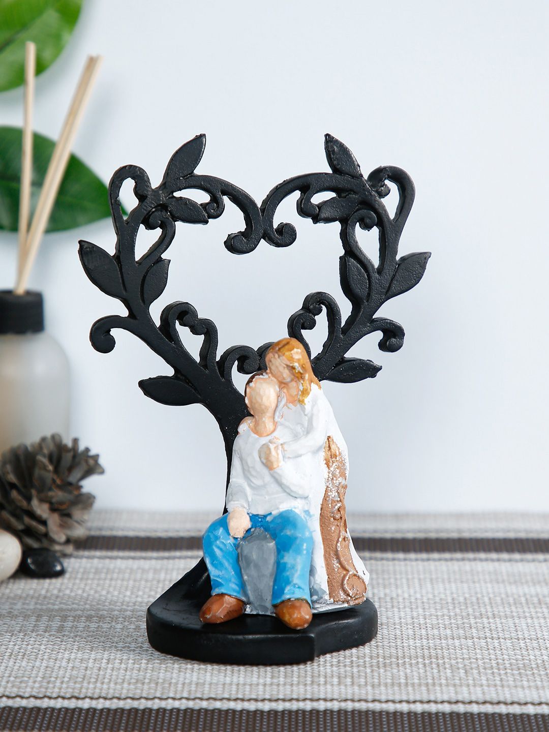 CraftVatika Black & White Romantic Valentine Love Couple Statue Showpiece Price in India