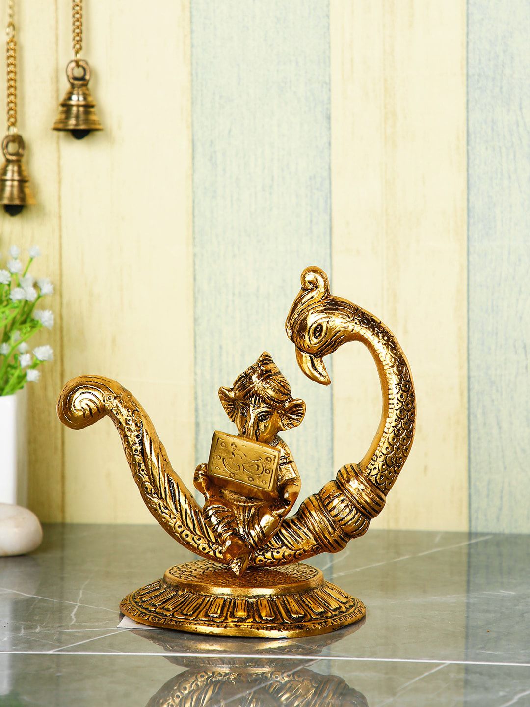 CraftVatika Gold-Toned Ganesha Idol Showpiece Price in India