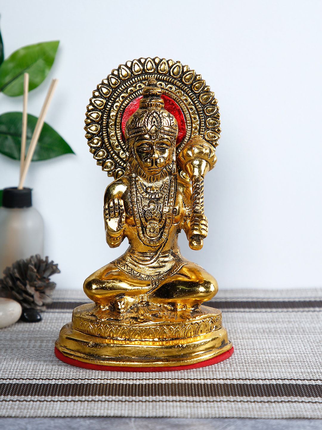 CraftVatika Gold-Toned & Red Lord Hanuman Idol Statue Showpiece Price in India