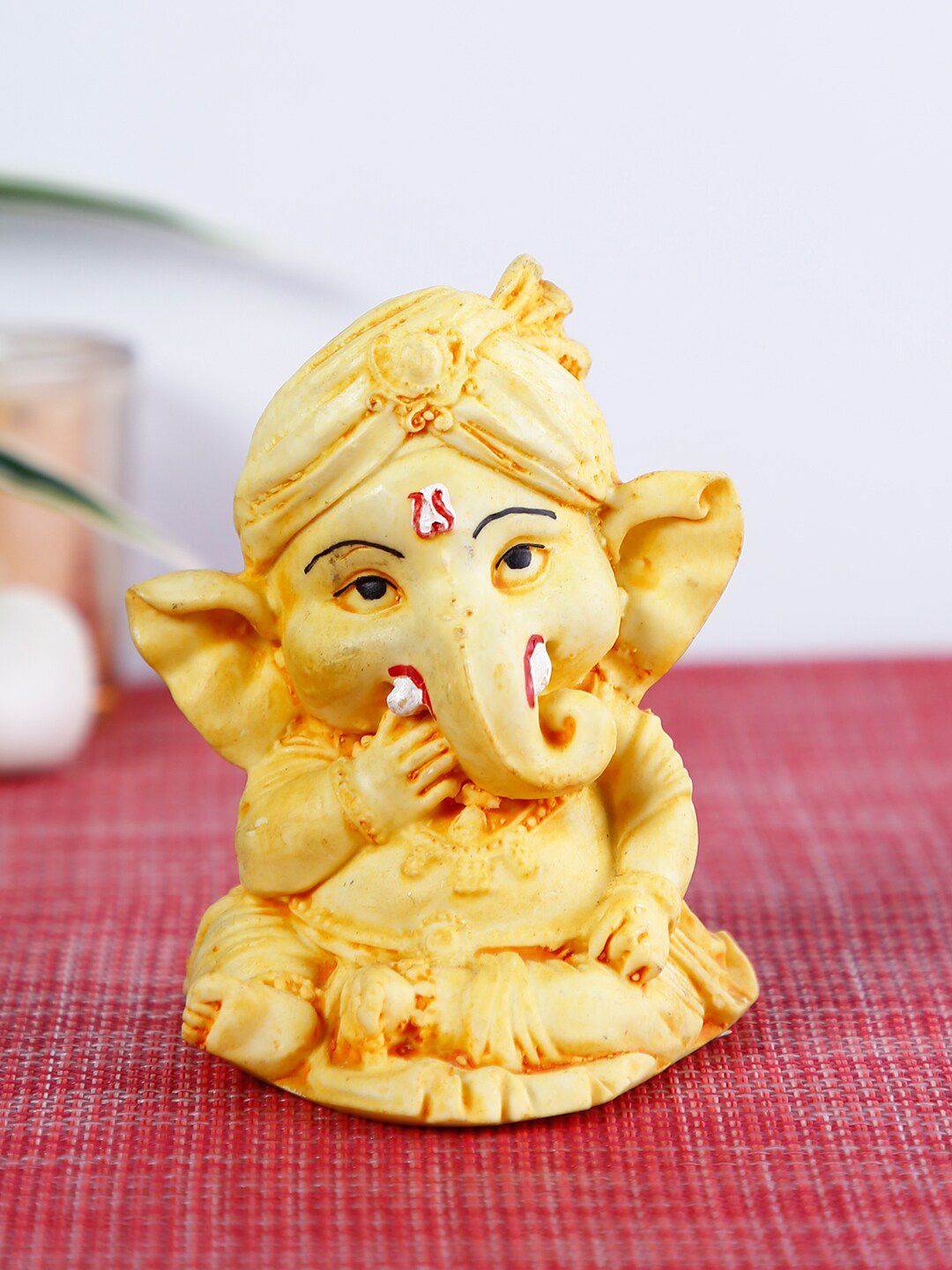 CraftVatika Yellow Bal Ganesha Idol Showpiece Price in India