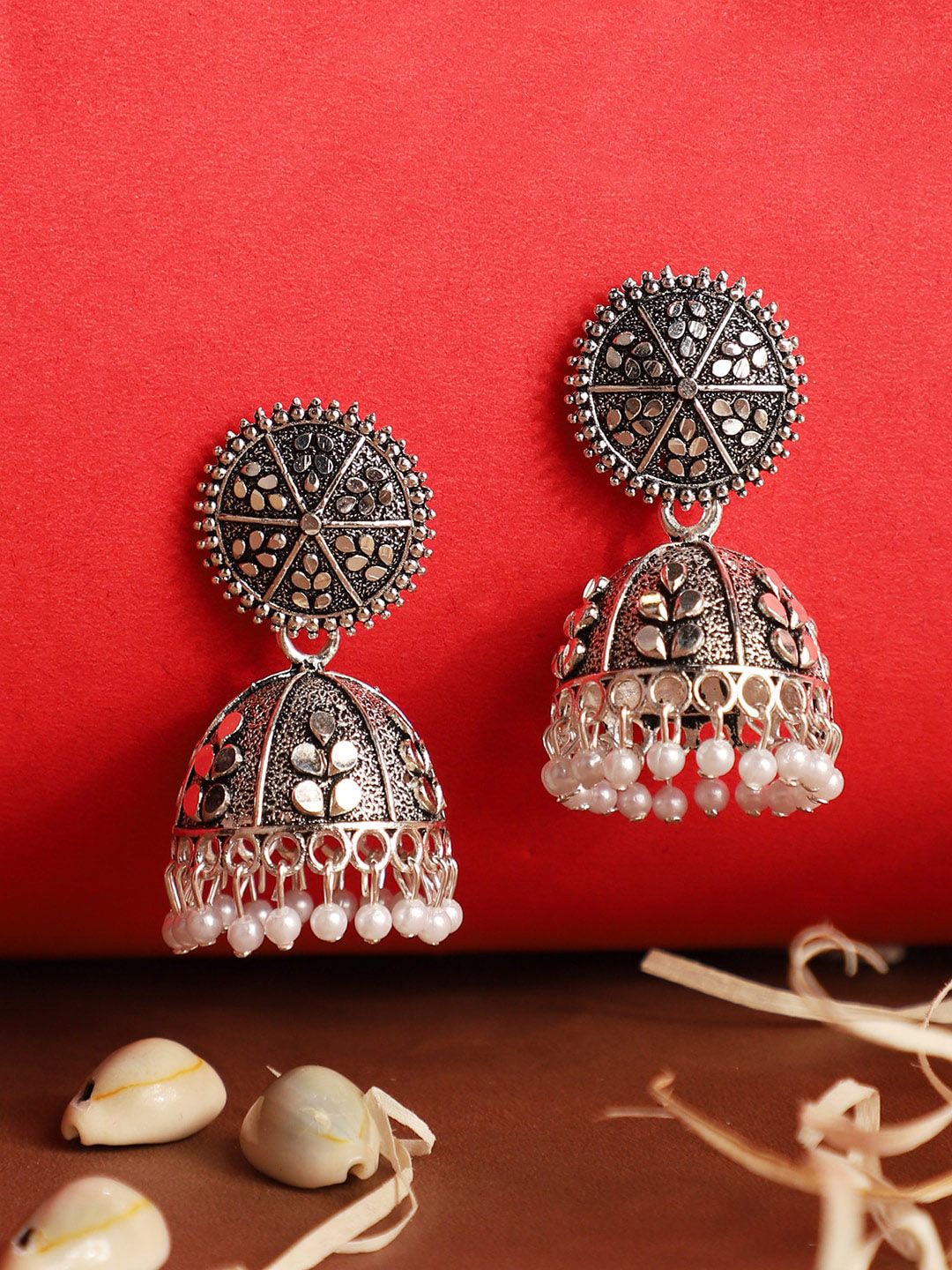 ANIKAS CREATION Silver-Toned Contemporary Jhumkas Price in India