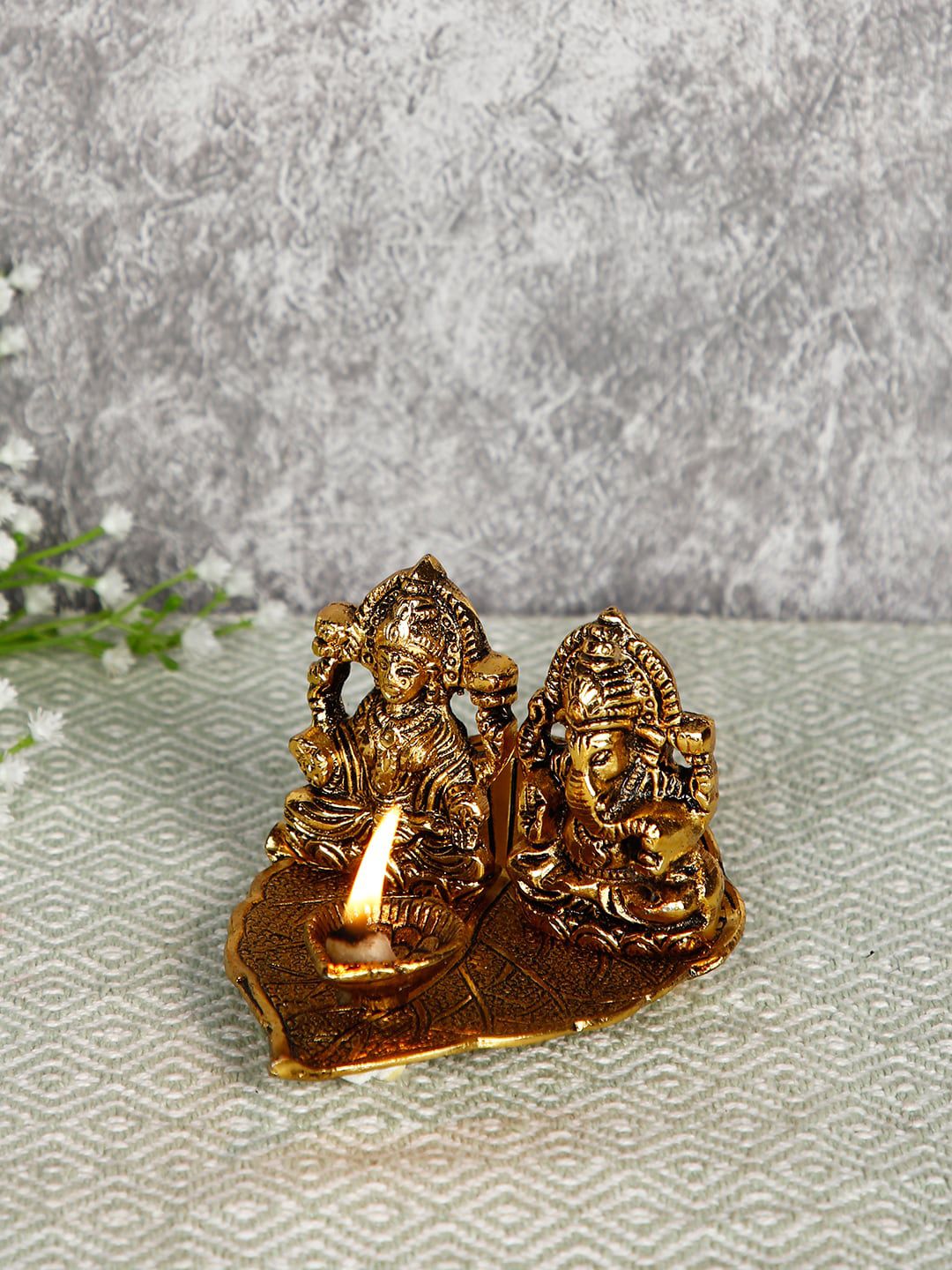 CraftVatika Gold-Toned Aluminium Lord Ganesh Idol Navratri Handmade Showpiece Price in India