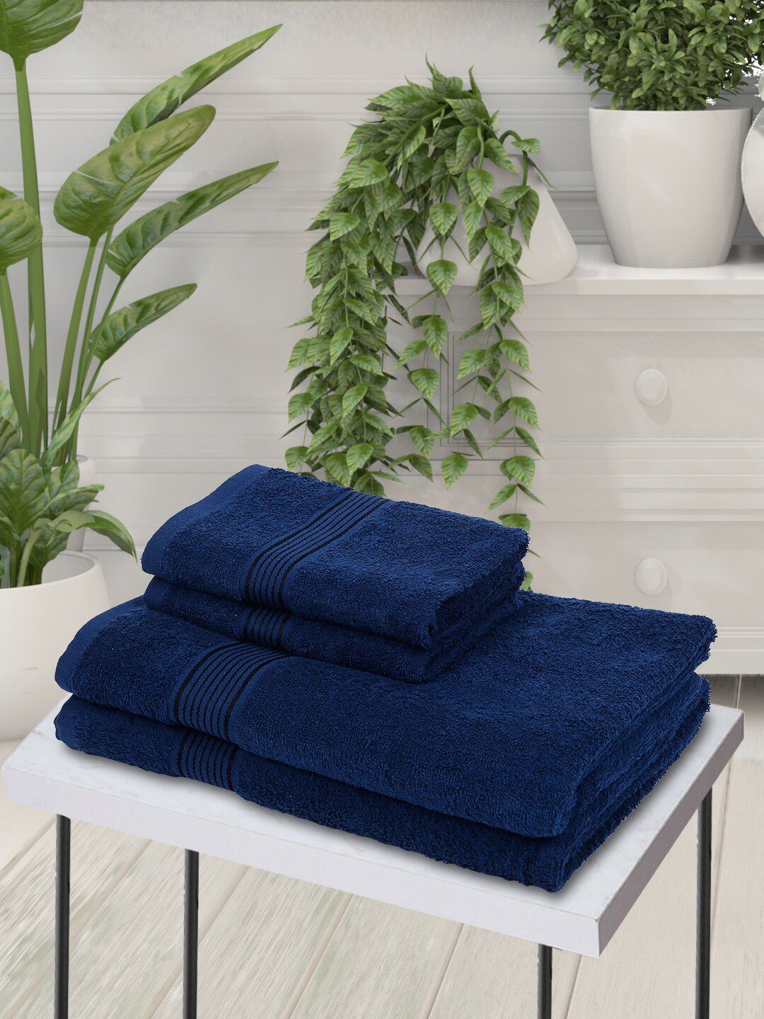 BIANCA Set of 4 Navy Blue Solid 380 GSM Towels Price in India