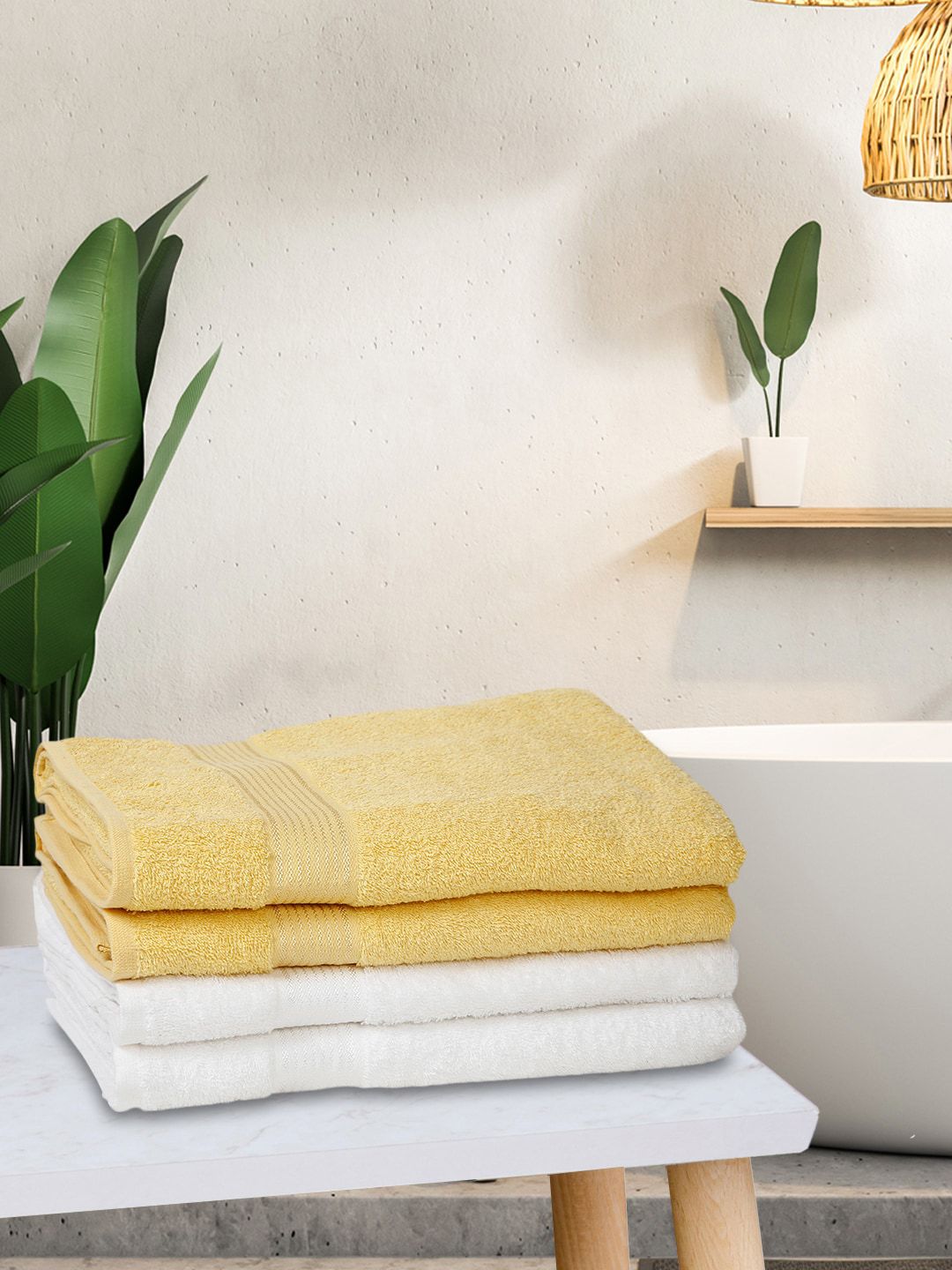BIANCA Yellow & White Set Of 4 Solid 380 GSM Cotton Bath Towels Price in India