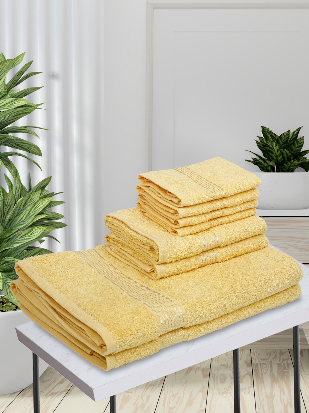 BIANCA Set of 8 Yellow Solid 380 GSM Cotton Towels Price in India
