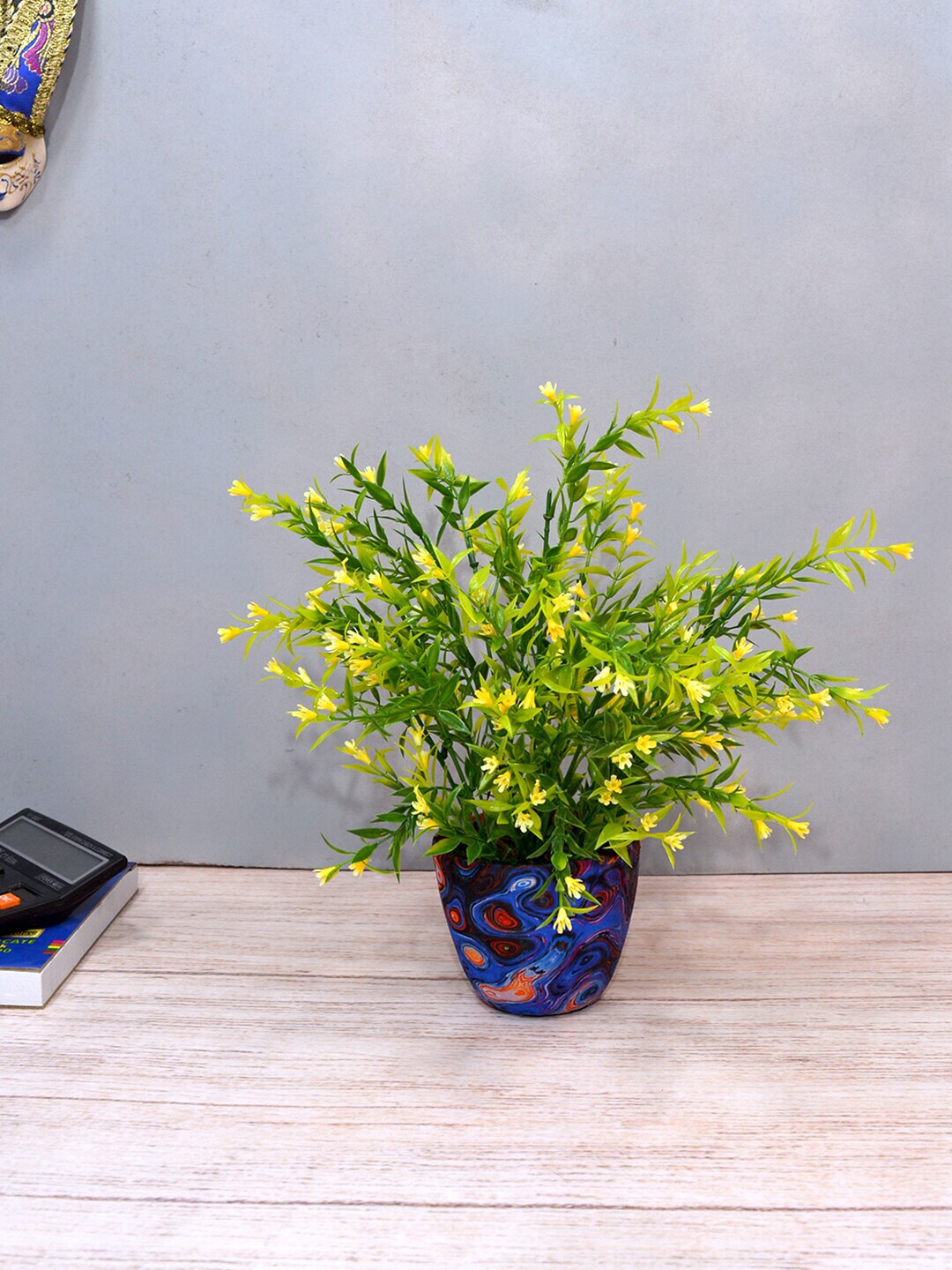 fancy mart Yellow Artificial Grass Flower in Blue & Orange Round Texture Pot Price in India