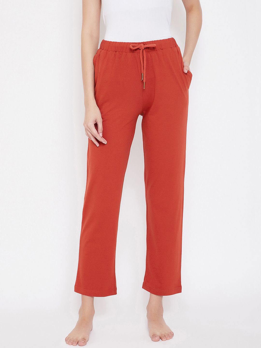 Hypernation Women Orange Solid Lounge Pants Price in India