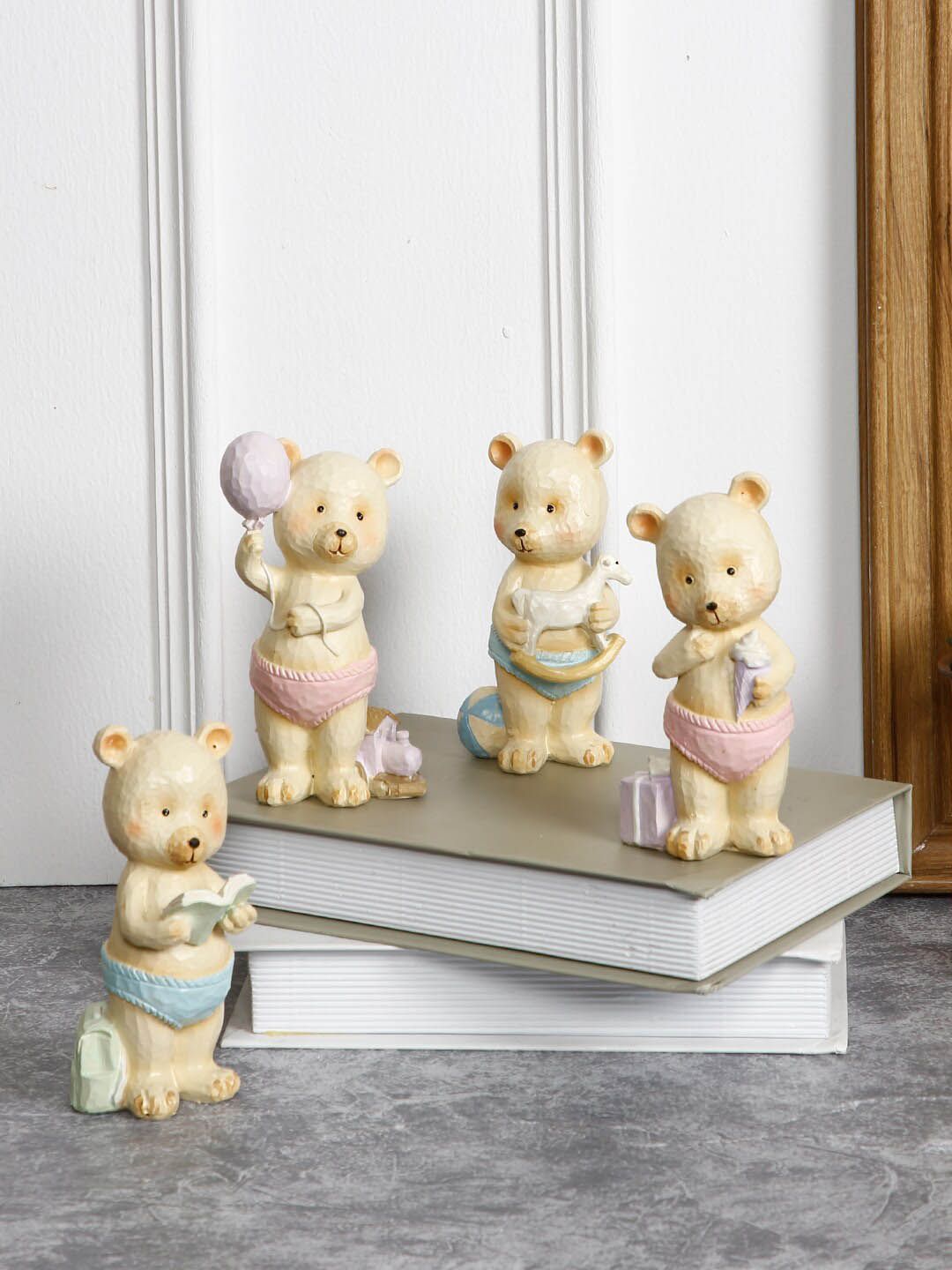 TAYHAA Set Of 4 Cream-coloured Bear Showpieces Price in India