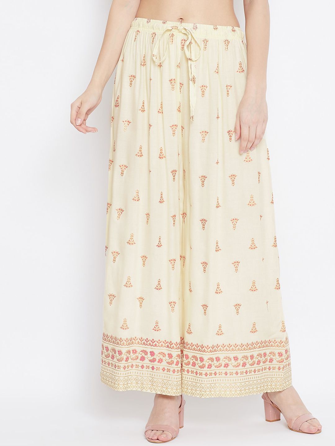 Clora Creation Women Cream-Coloured Printed Flared Palazzos Price in India