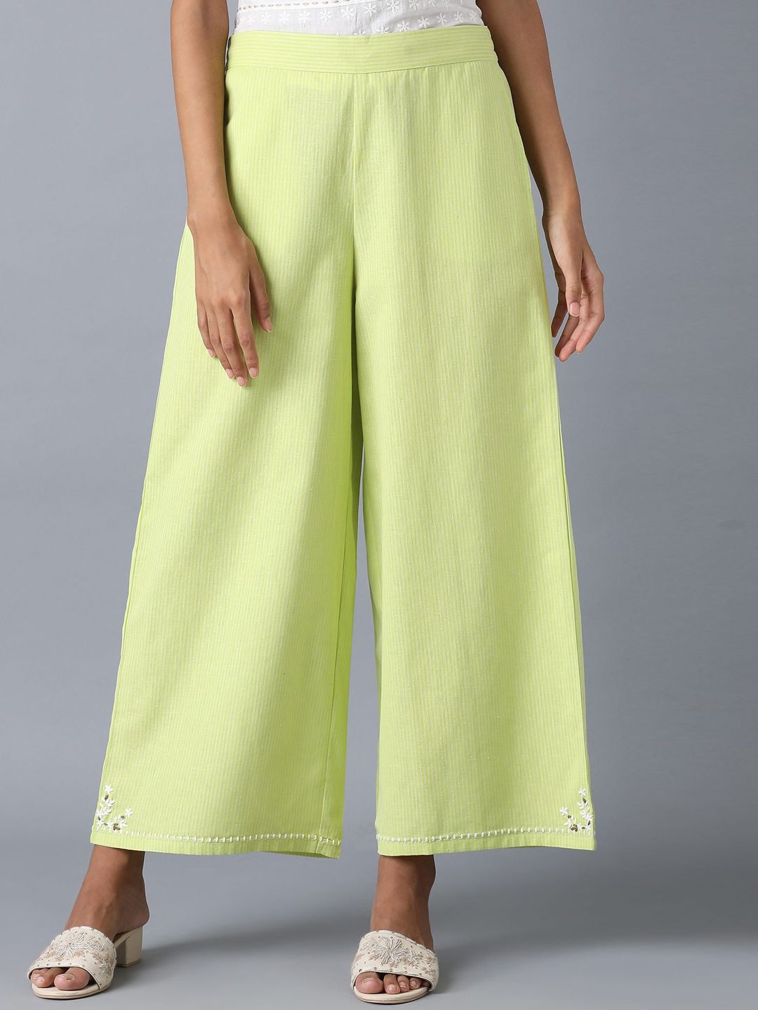W Women Lime Green & White Striped Flared Palazzos Price in India