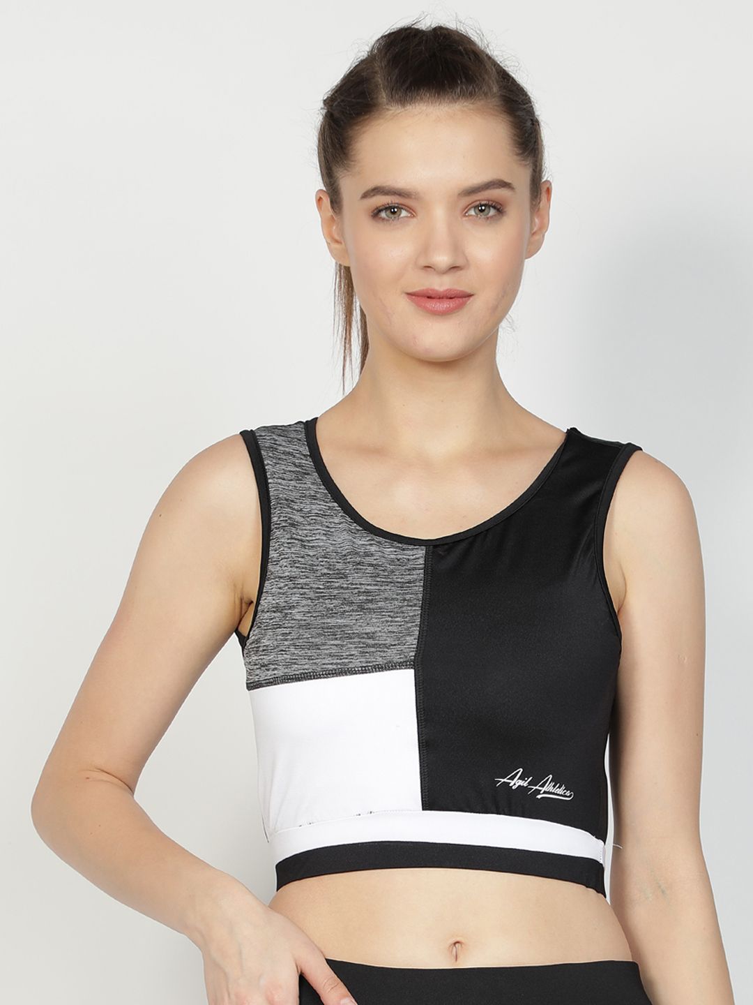 AGIL ATHLETICA Black & White Colourblocked Non-Wired Removable Padding Workout Bra AW2115B Price in India