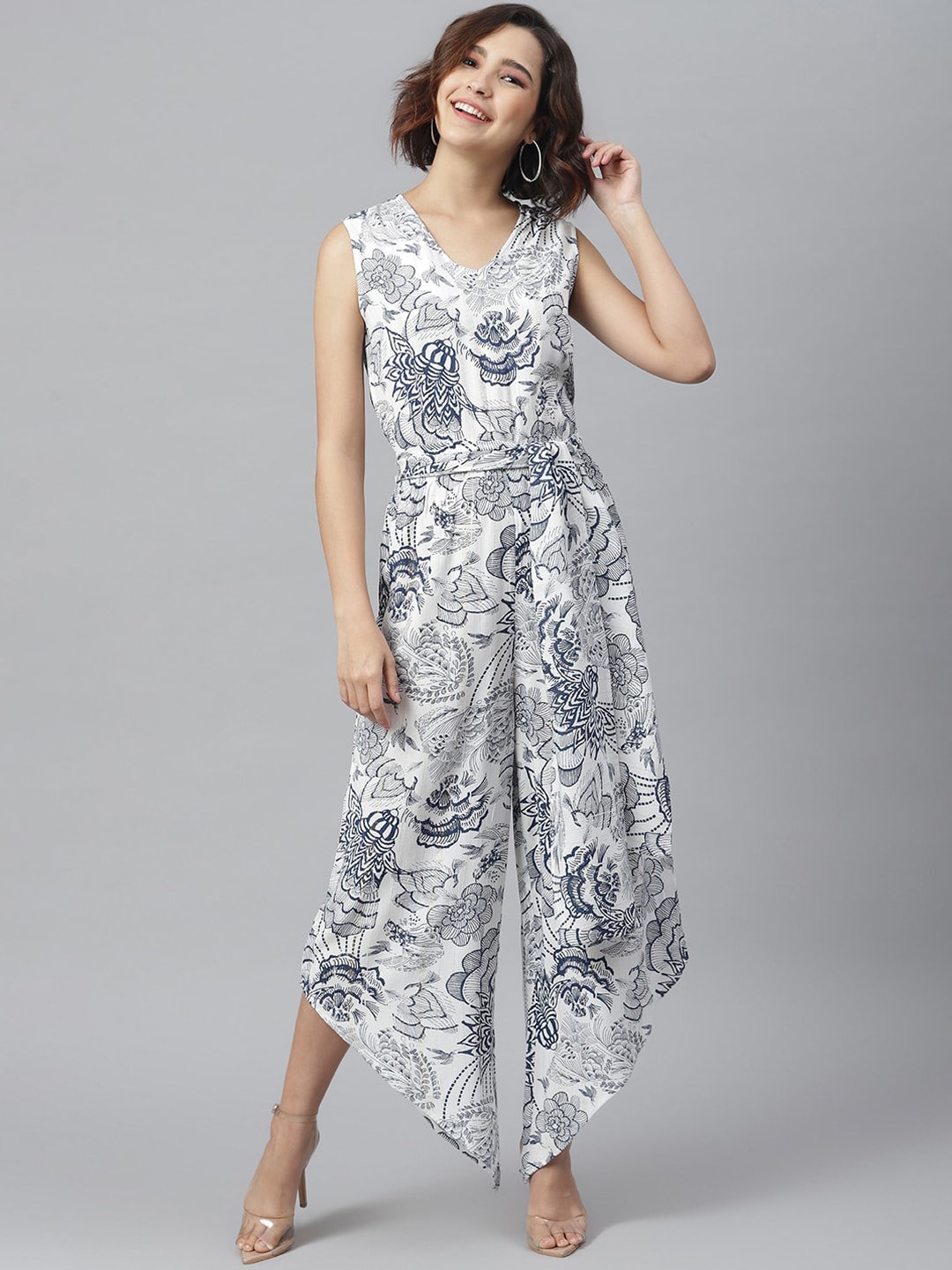 StyleStone Women White & Blue Printed Asymmetric Basic Jumpsuit Price in India