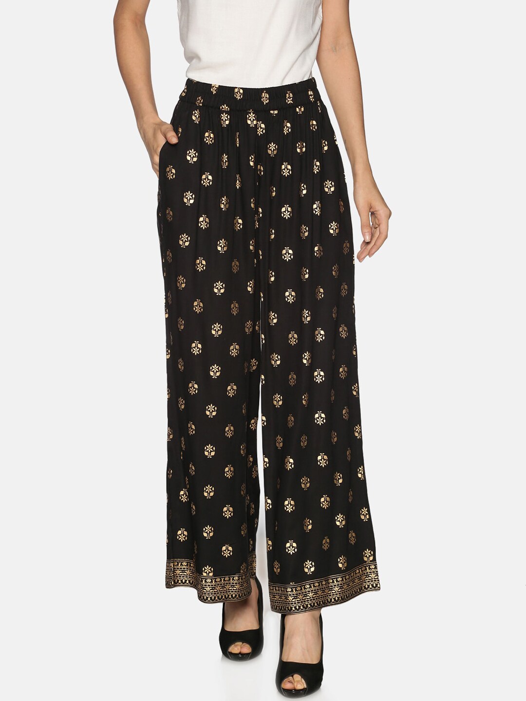 Saffron Threads Women Black & Gold-Toned Printed Flared Palazzos Price in India
