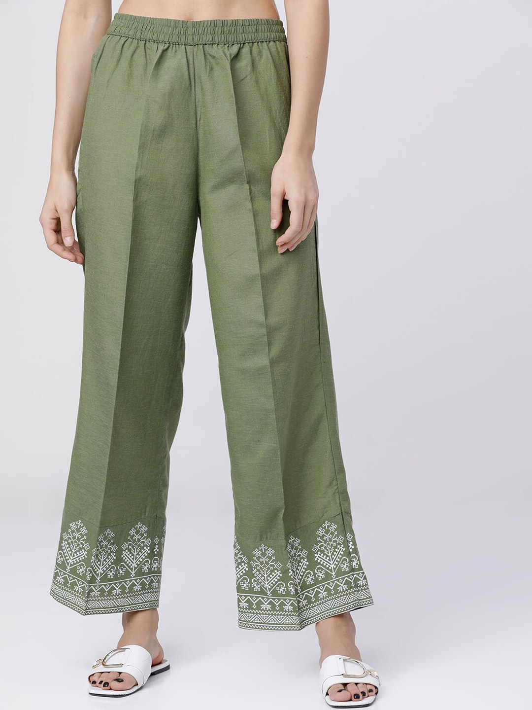 Vishudh Women Green & Off-White Printed Flared Palazzos Price in India