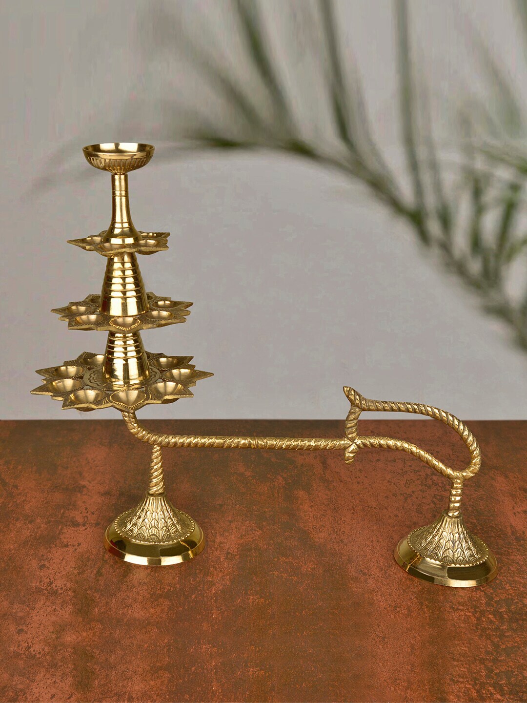 StyleMyWay Gold-Toned 4 Tier Ganga Aarti Pooja Diya With Handle Price in India