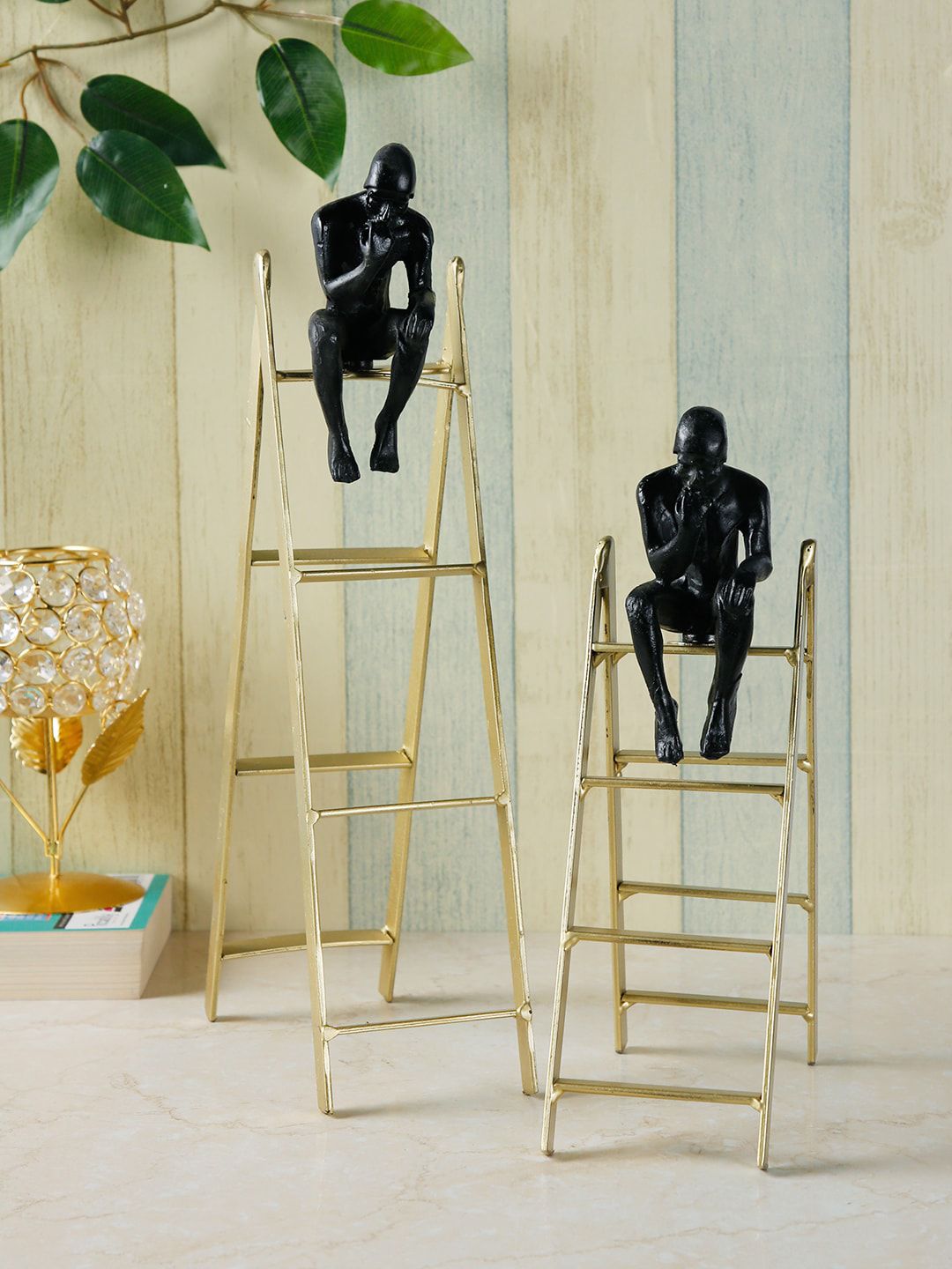 CraftVatika Set Of 2 Black & Gold-Toned Thinker Man On The Stair Showpieces Price in India