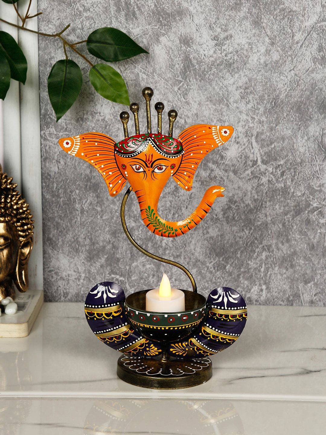 CraftVatika Orange & Black Handcrafted Ganesha Tea Light Candle Holder Showpiece Price in India