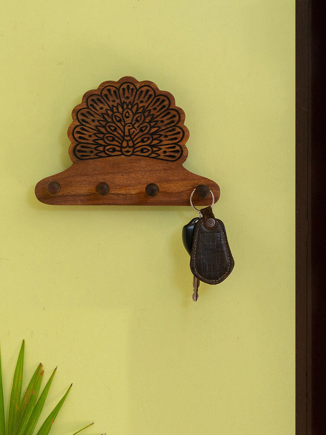 ExclusiveLane Brown Peacock Hand Carved Sheesham Wooden Key Holder Price in India