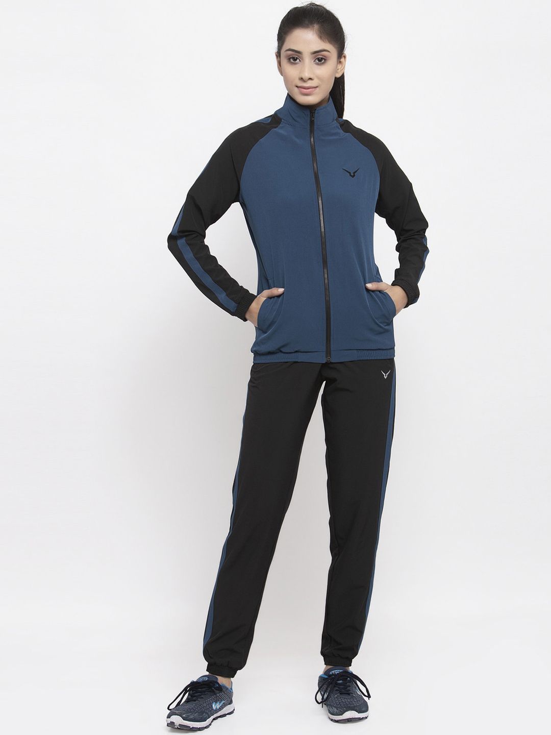 Invincible Women Blue & Black Solid Tracksuit Price in India