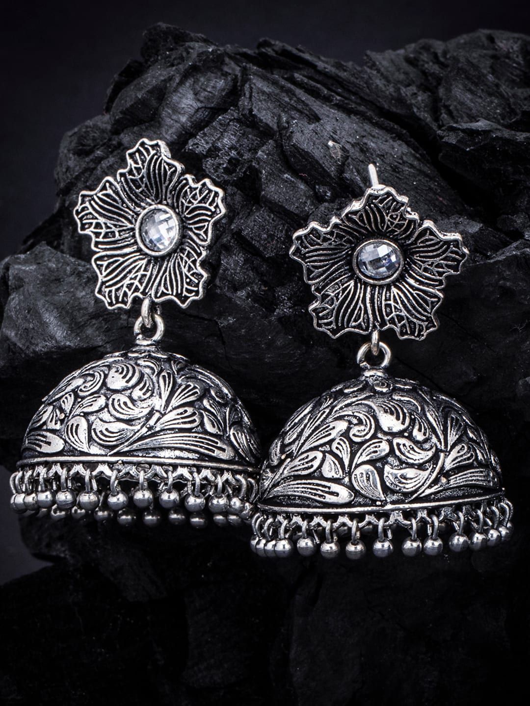 Sukkhi Oxidized Rhodium-Plated Floral Dome Shaped Jhumkas Price in India