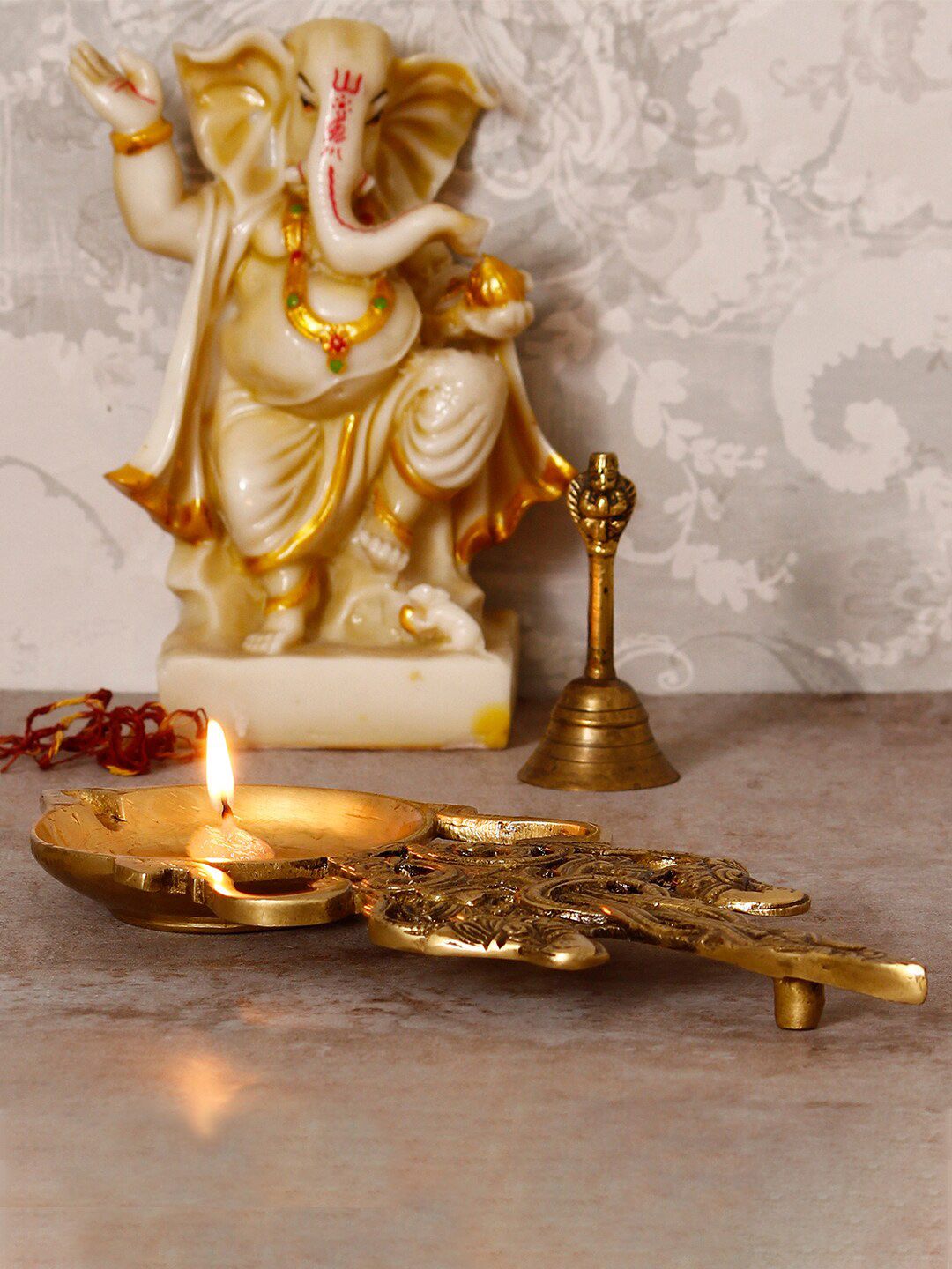 eCraftIndia Gold-Toned Carved Diya Price in India