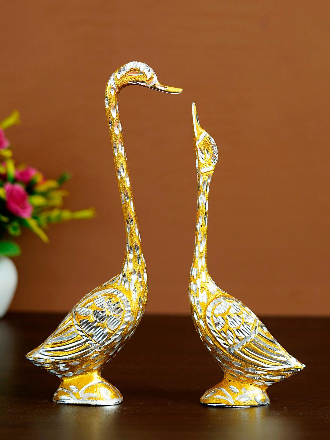 eCraftIndia Set of 2 Silver-Toned & Yellow Engraved Handcrafted Kissing Swan Showpieces Price in India