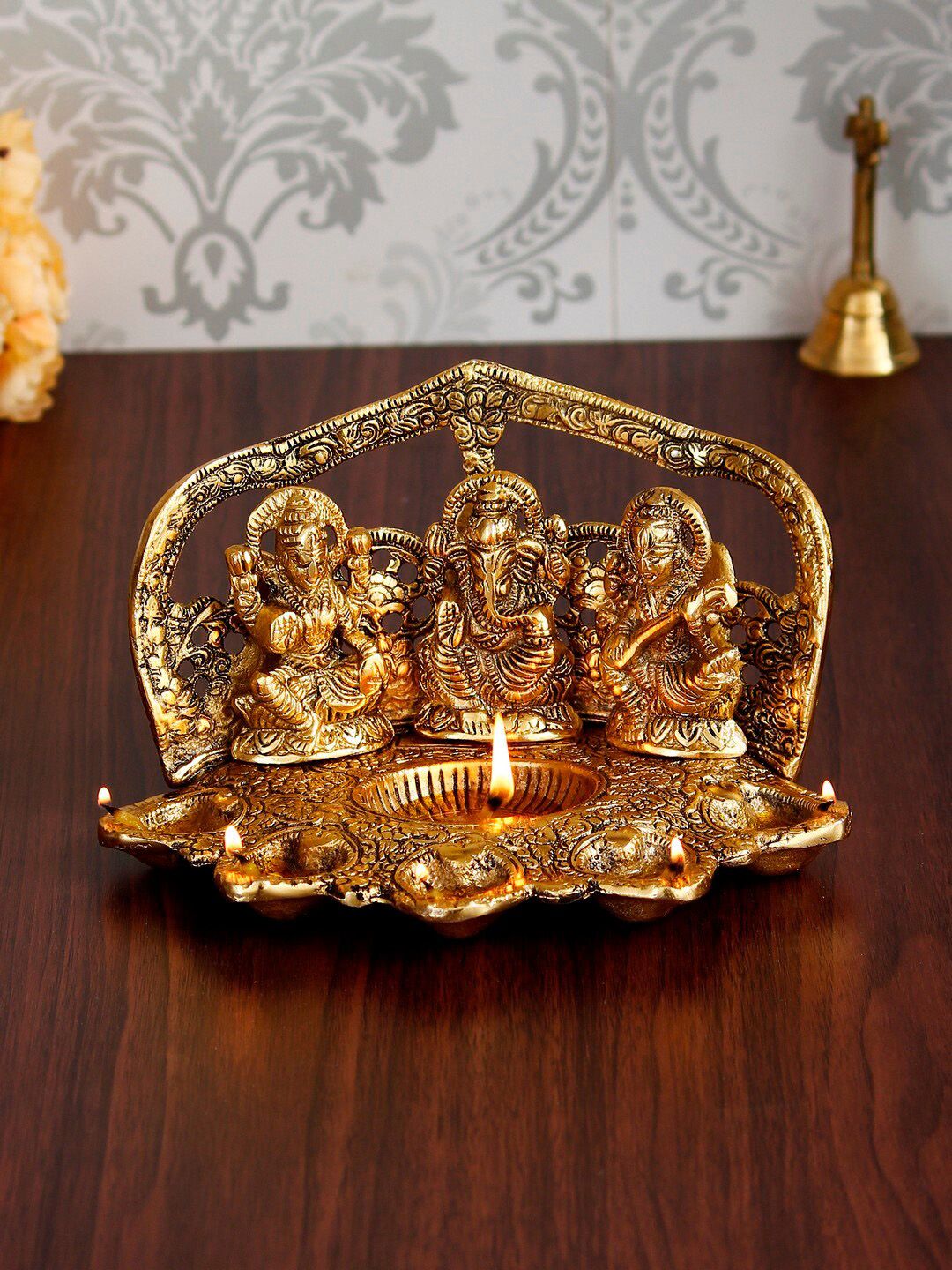 eCraftIndia Gold-Toned Laxmi Ganesha Saraswati with Diya for 6 Wicks Handcrafted Metal Decorative Showpiece Price in India