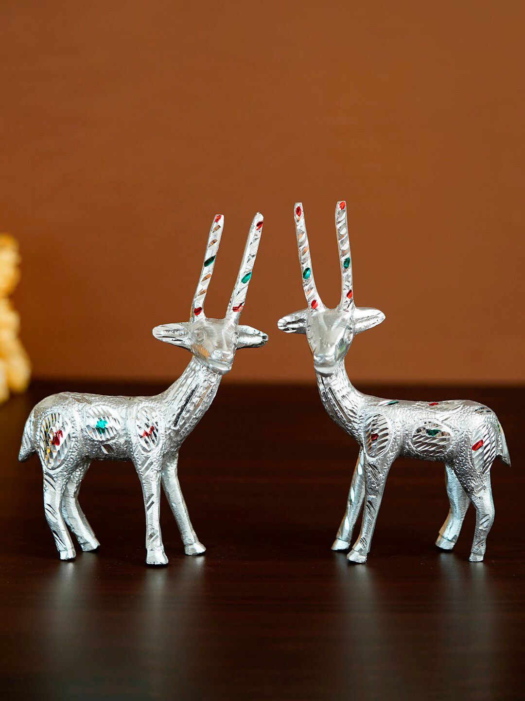 eCraftIndia Set Of 2 Silver-Toned Engraved Handcrafted Deers Decorative Showpiece Price in India
